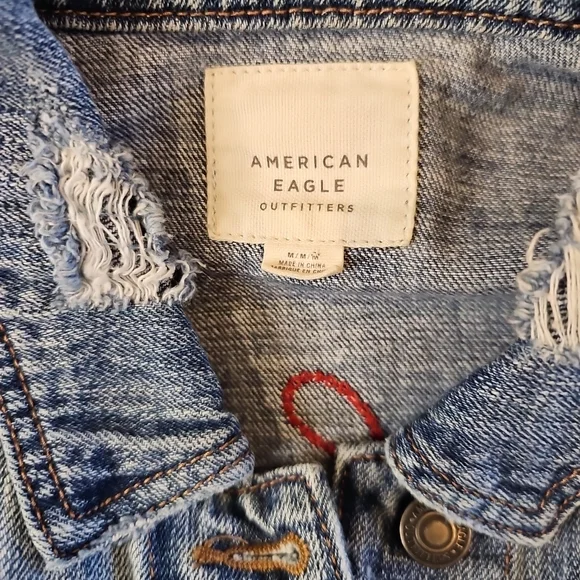 Classic Denim Jacket with Red Floral Detail - Picture 11 of 12